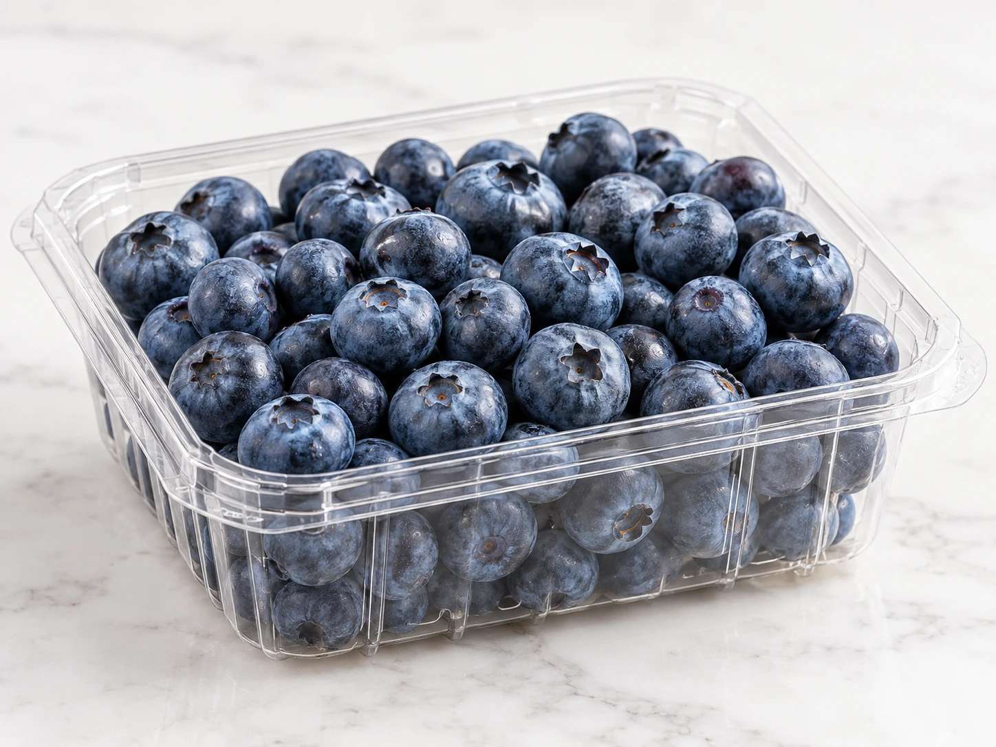 Fresh blueberries in a clear punnet